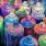 multi-colored painted cans of spray paints