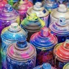 multi-colored painted cans of spray paints